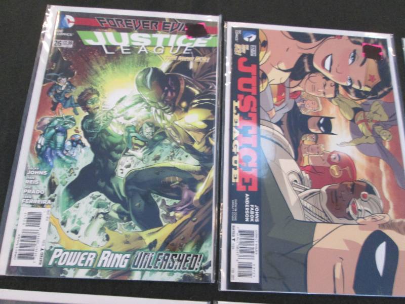 215. 6 Justice League Comic Books...