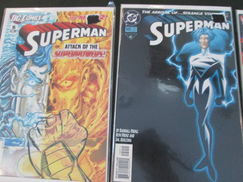 284. 6 SuperMan Comic Books...