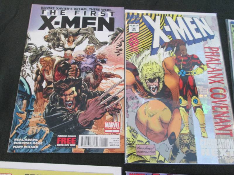 291. 6 X-Men Comic Books...