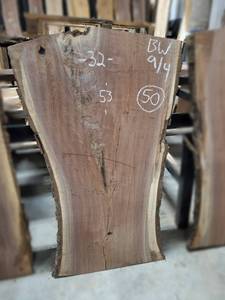 lot 50 image: BLACK WALNUT Live Edge Slab - Thickness 2-14 x 53 x 32 Max Width - Kiln Dried and Surfaced