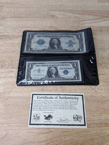 lot 9 image: (2) Two American Heritage Mint Certified Dollar Bills B