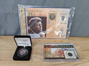 lot 35 image: Collectible Coins New York Penny, The Morgan Mint Tribute Ronald Reagan Quarter, Indian Head Penny, and JFK Half Dollar  B