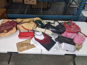 lot 203 image: A Variety of Different Sized Handbags  K