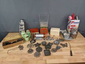 lot 236 image: Assorted Vintage Baking Items - Borg Kitchen Scale, Cookie Press, Wagner Ware Party Moulds, Green Glass Shakers, Cookie Cutters, Sterling Silver Coin Purse, and more S