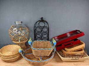 lot 234 image: Assorted Wicker and Wood Serving Trays and Charger Plates, Metal Wine Rack, and Pottery Barn Beverage Dispenser S
