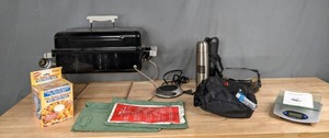 lot 249 image: The Onion Gourmet Onion Blossom Maker, Electronic Kitchen Scale, Chefs Choice International Pizzelle Pro, Thermos, Brookstone Beverage Warmer, Weber Grill and More S