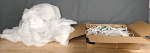 lot 228 image: Box of String Lights and Stack of Faux Snow Blankets  S