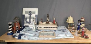 lot 83 image: Nautical Themed Decor - Shower Curtain, Wall Decor, Lamps, Lighthouses, etc. H