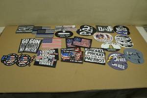 lot 54 image: Large Assortment Pro Gun Magnets