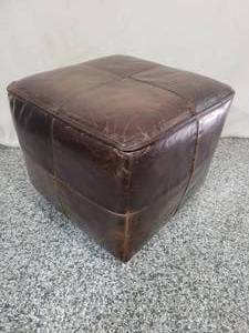 lot 25 image: Leather foot stool  ottoman.
