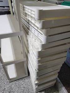 lot 31 image: Lot of 9 white shelves with all 144 posts.