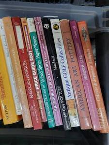 lot 28 image: Lot of 33 Collector BooksPrice Guides. Pottery. Golf. Knives. Paper Money. Guitars. American Antiques. Holiday Ornaments. Furniture. Rosemead. Barbie Dolls. Guns. Clocks. Cameras. Glass  others.