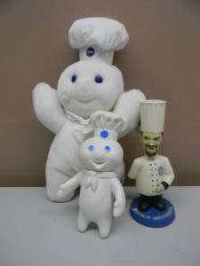 lot 13 image: VINTAGE 1990 Pillsbury Doughboy Poppin Fresh 25th Birthday Plush Doll - NEW IN PLASTIC - APPROX 13 - VINTAGE 1971 PILLSBURY DOUGHBOY RUBBER FIGURE APPROX 8 & VINTAGE SYSCO MINNESOTA BOBBLEHEAD - GREAT SET - SEE PICTURES