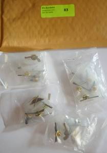 lot 83 image: 20 New hat or lapel pins of guns and bow and arrow