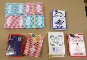 lot 184 image: 9 decks of playing cards, most from casinos