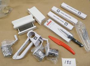 lot 185 image: Kitchen utensils - 5 New paring knives, meat tenderizer and cheese grater