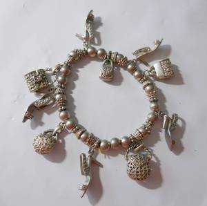 lot 199 image: Vintage charm bracelet with heels and purses  handbags