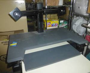 lot 214 image: Ergotron SitStand elevating stand for monitor and keyboard so you can work standing