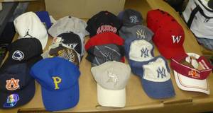 lot 236 image: 23 ballcaps with various logos on them