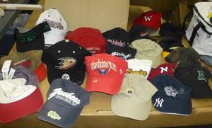 lot 237 image: 23 ballcaps with various logos on them