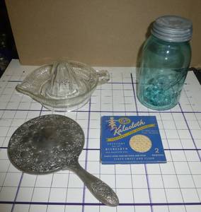 lot 257 image: Vintage collection with a juicer, nice heavy hand mirror, paper washcloth and ball jar
