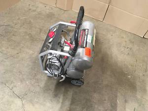 lot 27 image: Husky 4.5 Gal. Portable Electric-Powered Silent Air Compressor, Open Box, Review all pictures