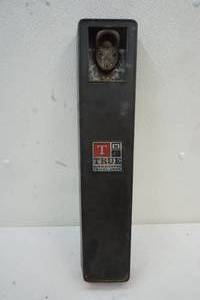 lot 79 image: TMC bottle opener