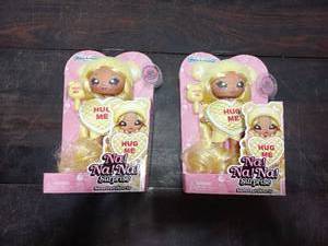 Two Hug Me Na Na Na Surprise Dolls