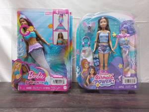 Two Barbie Dolls