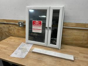 lot 126 image: HOME DECORATORS COLLECTION 24-12 in. W x 25-34 in. H Fog Free Framed RecessedSurface-Mount Bi-View Bathroom Medicine Cabinet in White w Mirror