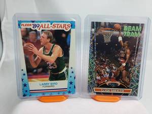 lot 9 image: Lot of 2 clyde Drexler Topps Stadium Club Beam Team 4 of 21, Larry Bird 89 All-Stars Sticker No. 10