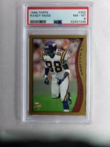 lot 17 image: Randy Moss Draft Picks Rookie Card 1998 Topps #352 PSA NM-MT 8