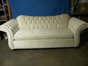 lot 8 image: LaPerla White Tufted Sofa with Studs