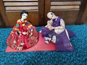 lot 63 image: Pair of Asian Dolls