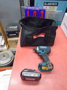 lot 103 image: Makita 18 volt impact & battery with case. No charger. Tested & works. As shown.