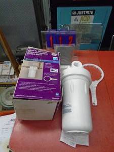 lot 112 image: GE water filtration unit. As shown.