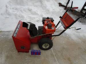 lot 123 image: Snow Champ 826 electric start snow blower. Used condition. Tested & works. As shown.