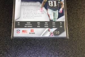 lot 3 image: 2009 National Treasures Century Game Worn Jersey Relic Randy Moss #59 2950  Only 50 Exist