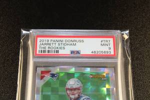 lot 22 image: 2019 Donruss The Rookies Jarrett Stidham #TR7 Rookie Card PSA 9