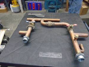 1 12 copper manifold. As shown.