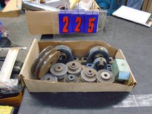 Assortment of cast iron pulleys & pillow blocks. As shown.