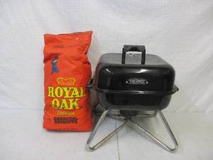 lot 23 image: Thermos Portable Charcoli Grill and Charcoal.