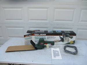 lot 73 image: Brand new in box Black & Decker Heavy Duty 18 electric Hedge Trimmer with manual.