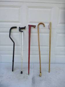 lot 100 image: Lot of Canes & Yard Stick
