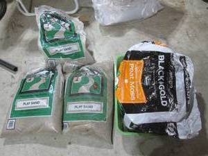 lot 18 image: Play sand and peat moss...