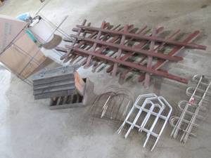 lot 25 image: Wood and metal trellises and a bird...