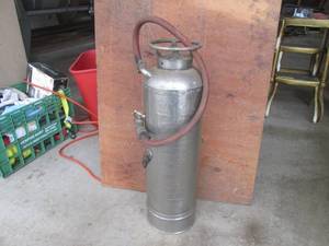 lot 31 image: No. 3 Roughrider antique fire extin...