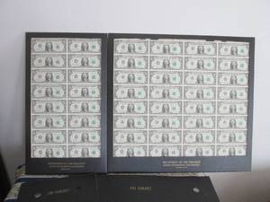 lot 7 image: 2 Uncut sheets of $1.00 bills one 1...