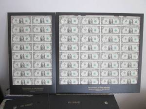 lot 8 image: 2 Uncut sheets of $1.00 bills one 1...