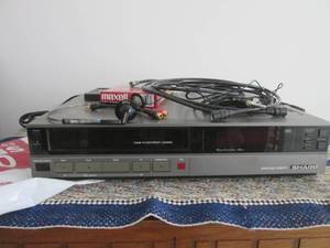 lot 12 image: Sharp VHS player...